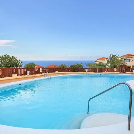 Elegant Coastal Retreat With Private Terrace & Pool Access Ferienhaus