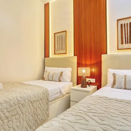 Ferienhaus Elegant Coastal Retreat With Private Terrace & Pool Access Caleta De Fuste