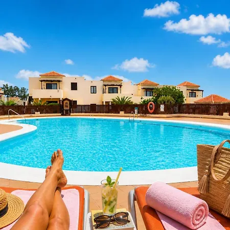 Elegant Coastal Retreat With Private Terrace & Pool Access Ferienhaus